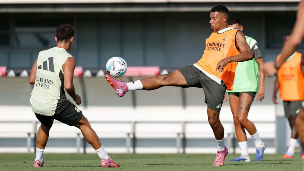 Real Madrid player Kylian Mbappe with the partner during their morning training session. 