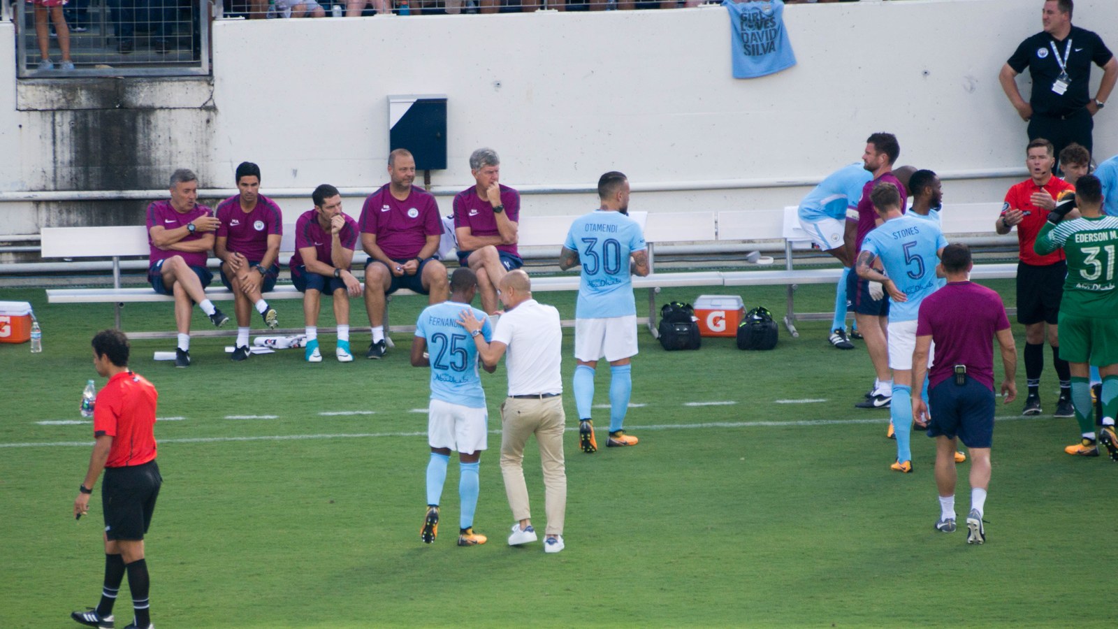 Pep Guardiola speaking with a Manchester City player near the touchline, used as the feature image for Manchester City final-weekend reset analysis.
