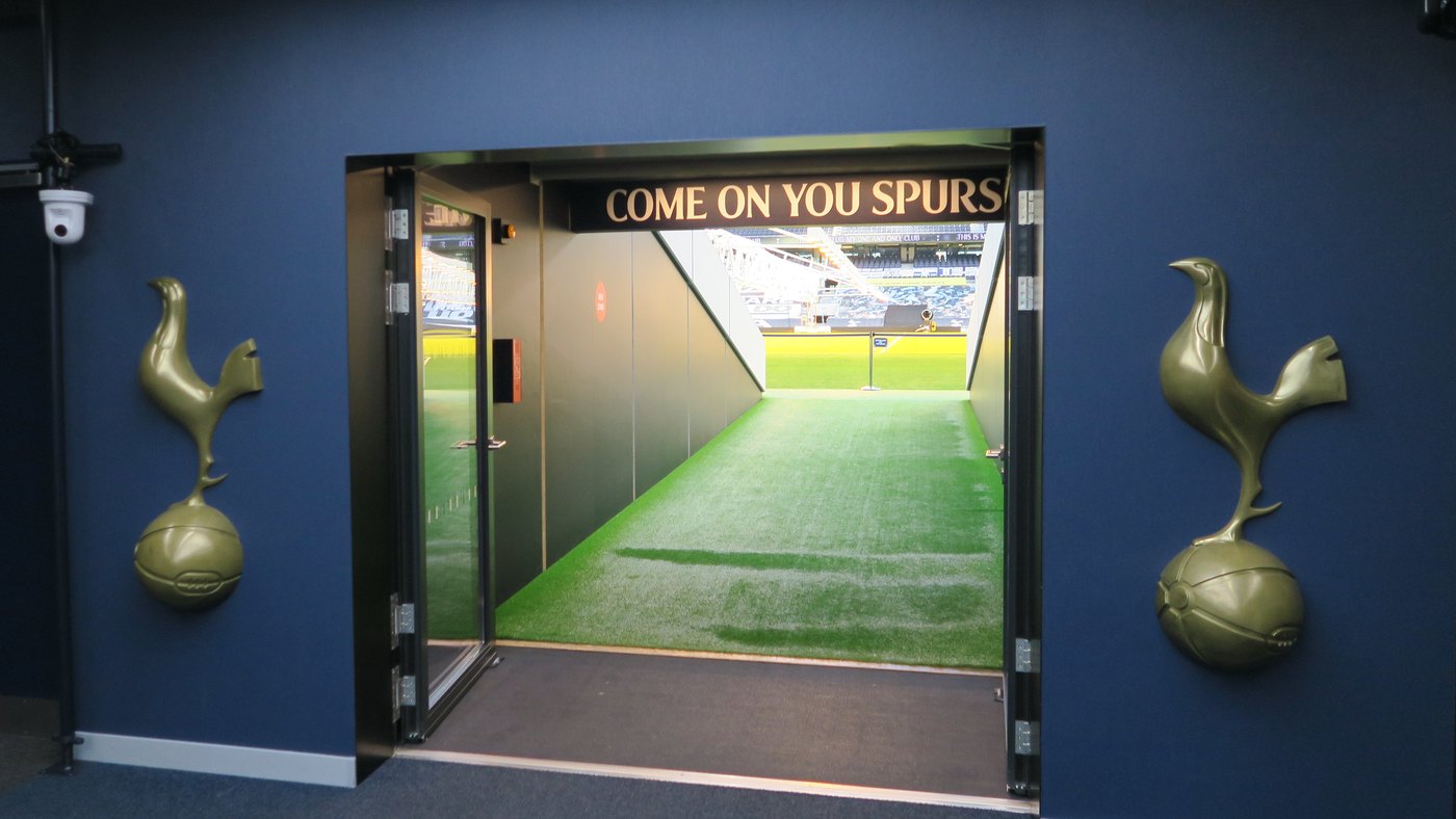 View from the Tottenham Hotspur Stadium players tunnel toward the pitch, illustrating final-day pressure and match preparation.