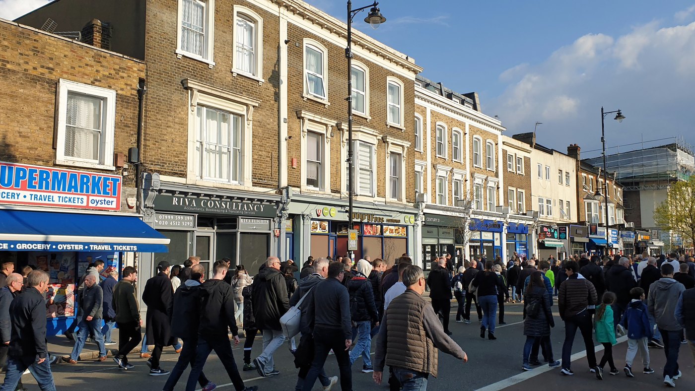 Tottenham Hotspur matchday scene with supporters and stadium atmosphere, illustrating fan pressure on a Premier League final day.